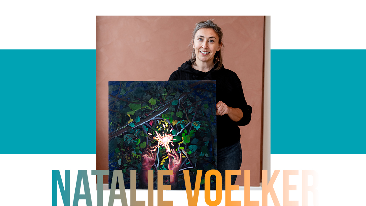 Artist Natalie Voelker holds her painting Fire Striker.