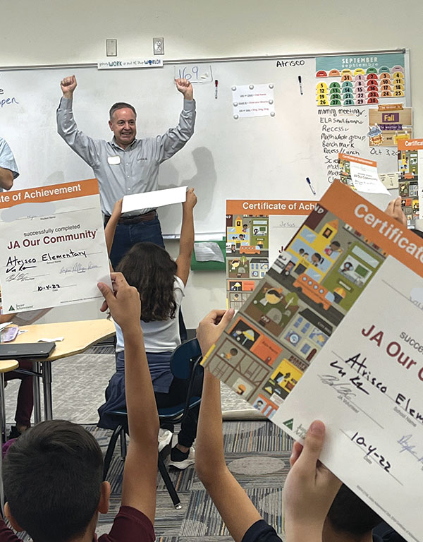 Junior Achievement Volunteers in the classroom
