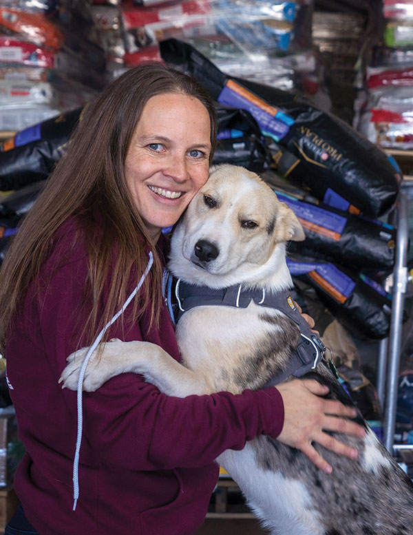 Founder Angela Cerci and one of her rescue dogs